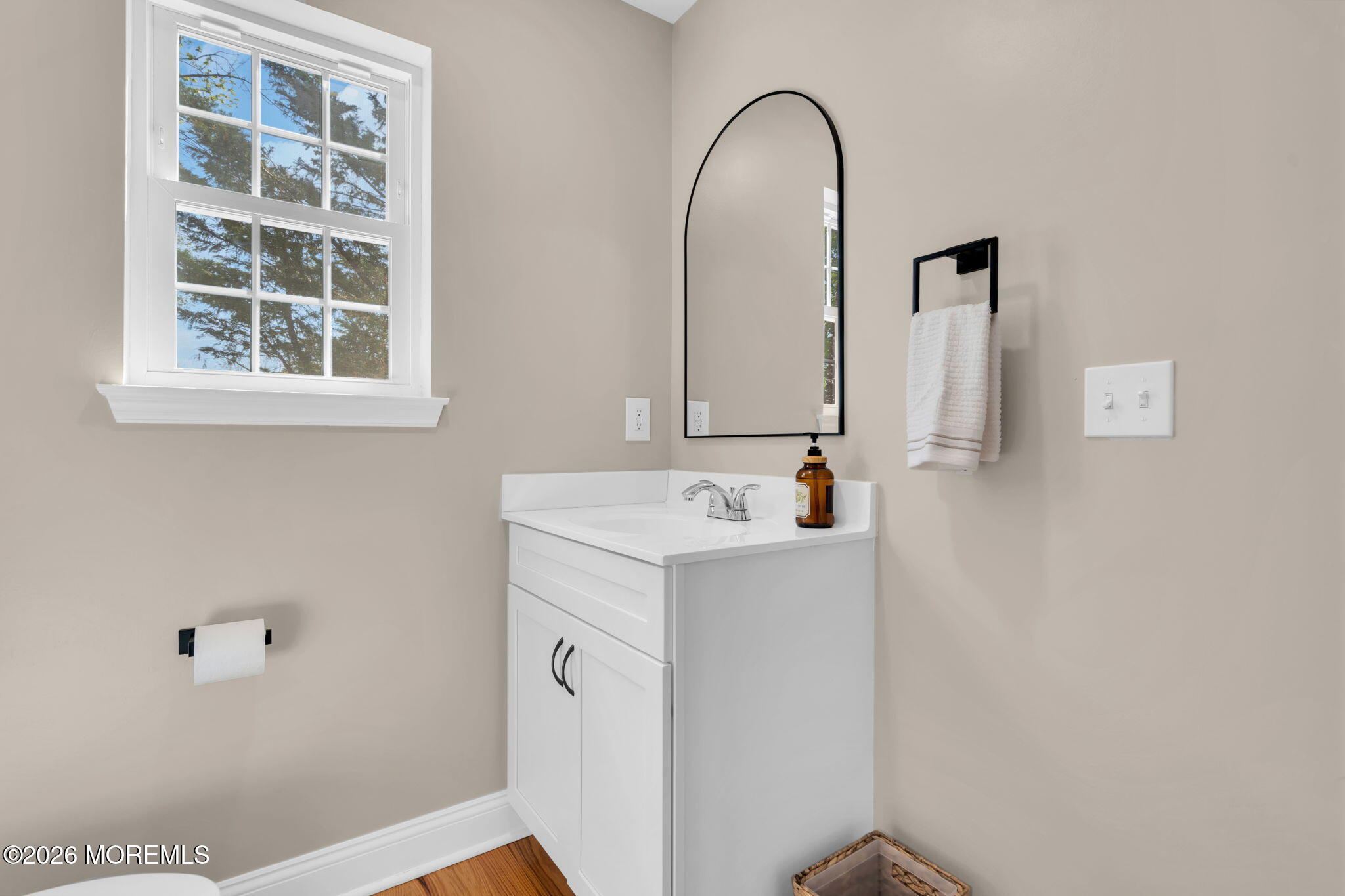 312 Beach Boulevard Forked River, NJ 08731 - Photo 26 of 40 a bathroom with a sink and a mirror