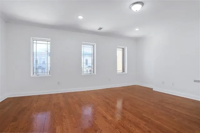 an empty room with windows