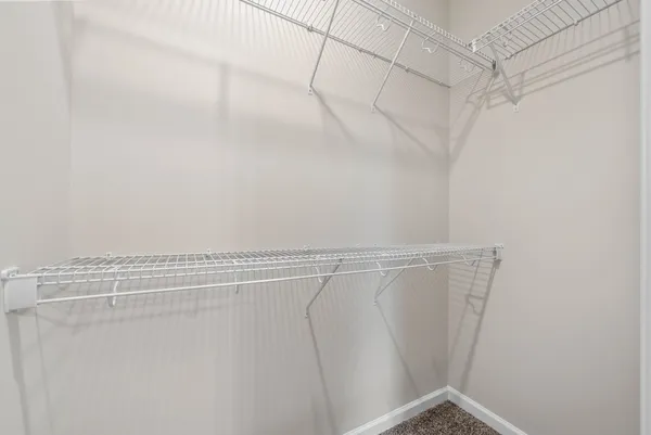 a view of a room with racks on the wall