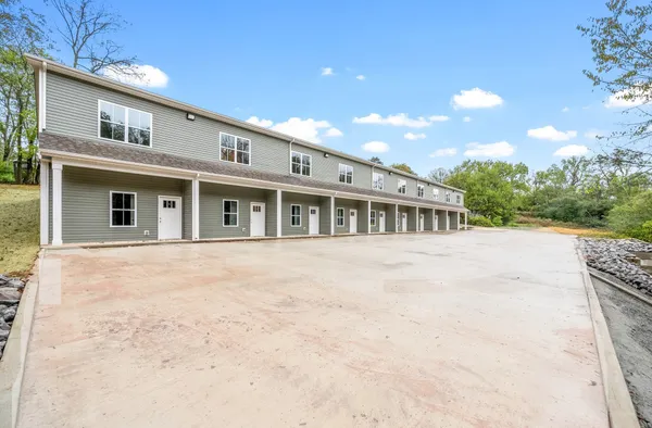a front view of house with yard