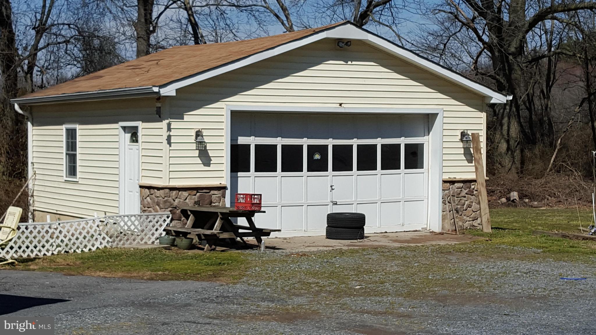 3701 Damascus Road Brookeville, MD 20833 - Photo 4 of 15 a view of a white house with swimming pool in front of it