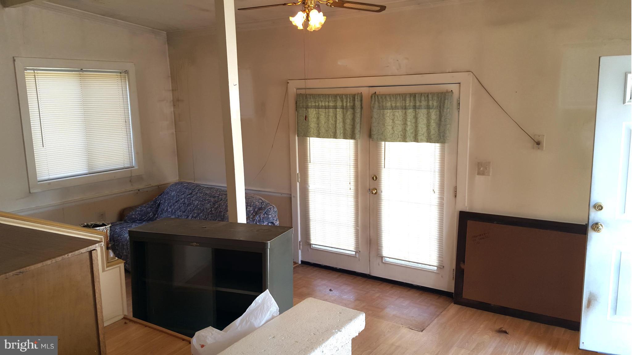 3701 Damascus Road Brookeville, MD 20833 - Photo 6 of 15 a room with furniture and window