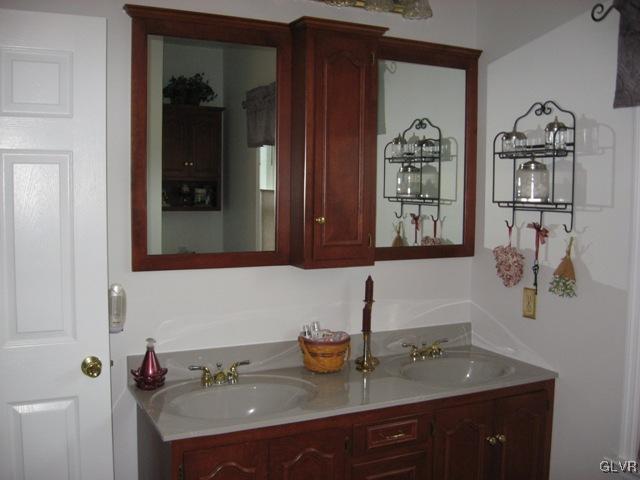 195 West Butternut Road Hellertown, PA 18055 - Photo 14 of 23 a bathroom with sink and mirror