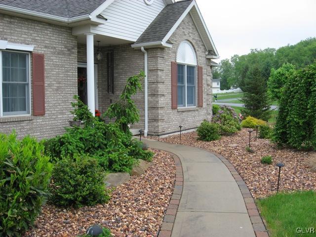 195 West Butternut Road Hellertown, PA 18055 - Photo 2 of 23 a front view of a house with a yard