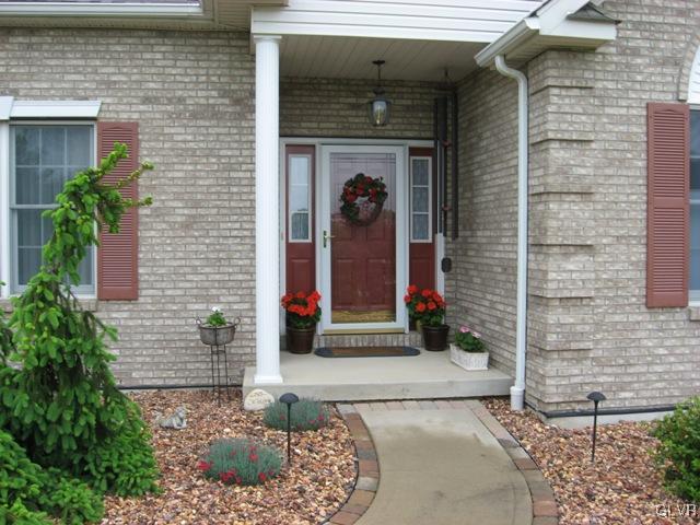 195 West Butternut Road Hellertown, PA 18055 - Photo 5 of 23 a front view of a house with a yard