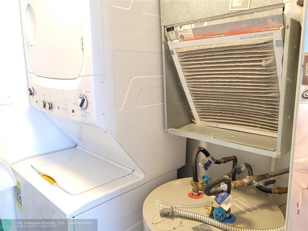 1500 North Ocean Boulevard, Unit 901 Pompano Beach, FL 33062 - Photo 19 of 19 a bathroom with a sink and a mirror