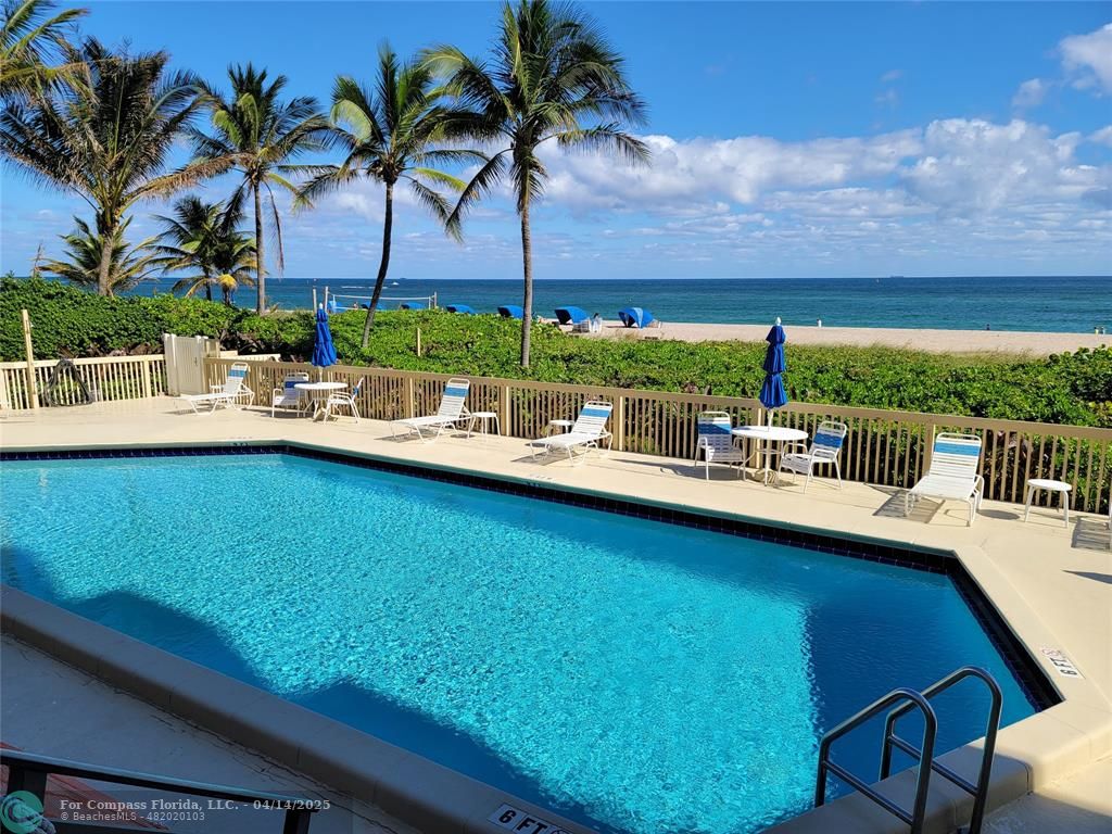 1500 North Ocean Boulevard, Unit 901 Pompano Beach, FL 33062 - Photo 3 of 19 a view of swimming pool with outdoor seating