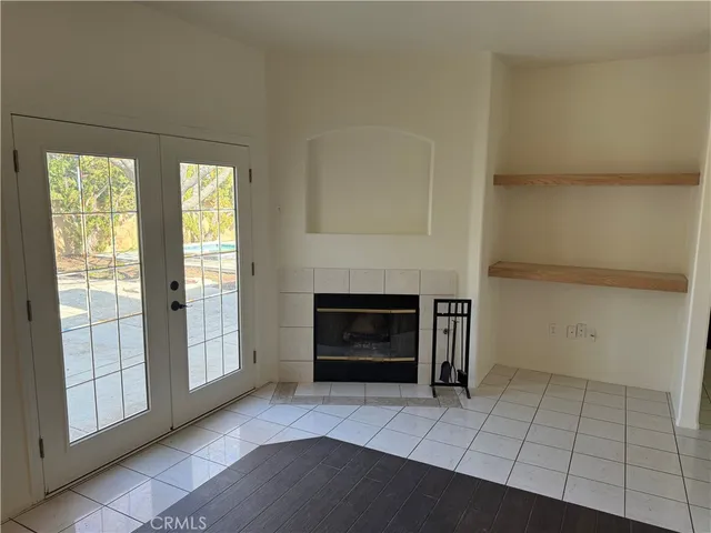a living room with a fireplace