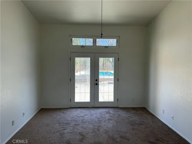 an empty room that has a window