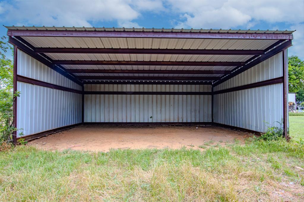 483 Christy Kay Lane Rhome, TX 76078 - Photo 31 of 40 a view of a backyard with hardwood