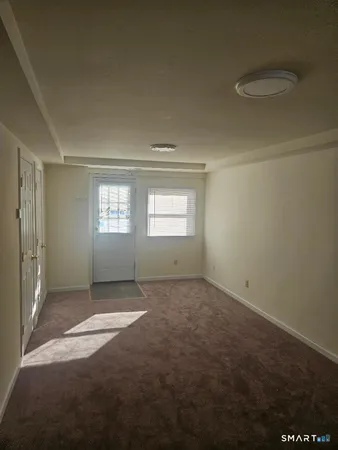 a view of an empty room with window