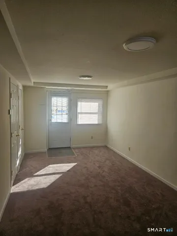 a view of an empty room with window