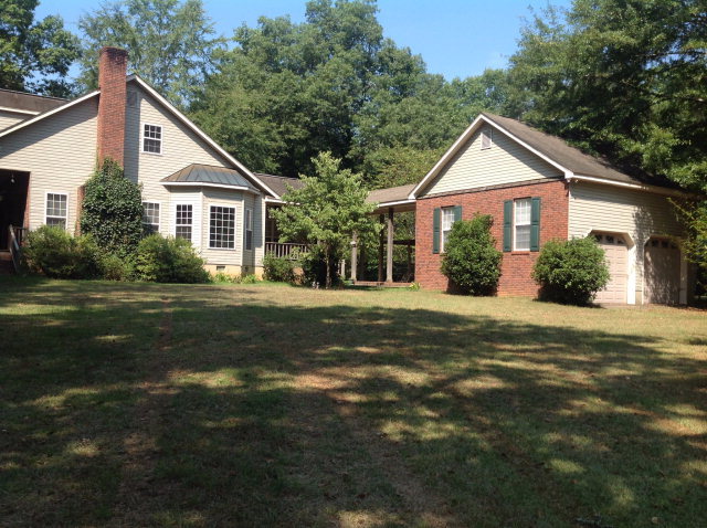524 Chambers Road Macon, GA 31217 - Photo 3 of 42 a front view of house with yard and green space
