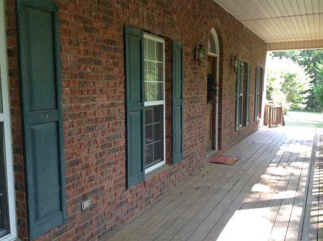 524 Chambers Road Macon, GA 31217 - Photo 5 of 42 a view of a brick house with a large window