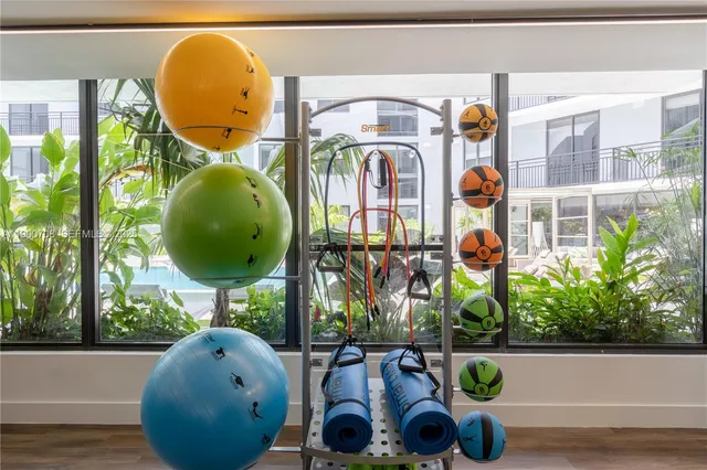 a view of living room with furniture and rug