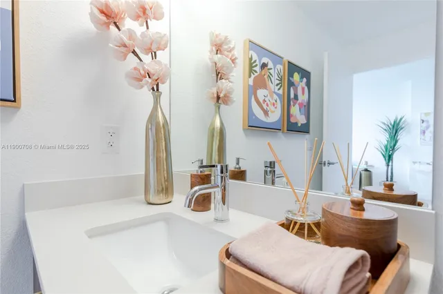 a bathroom with a toilet a sink and bathtub