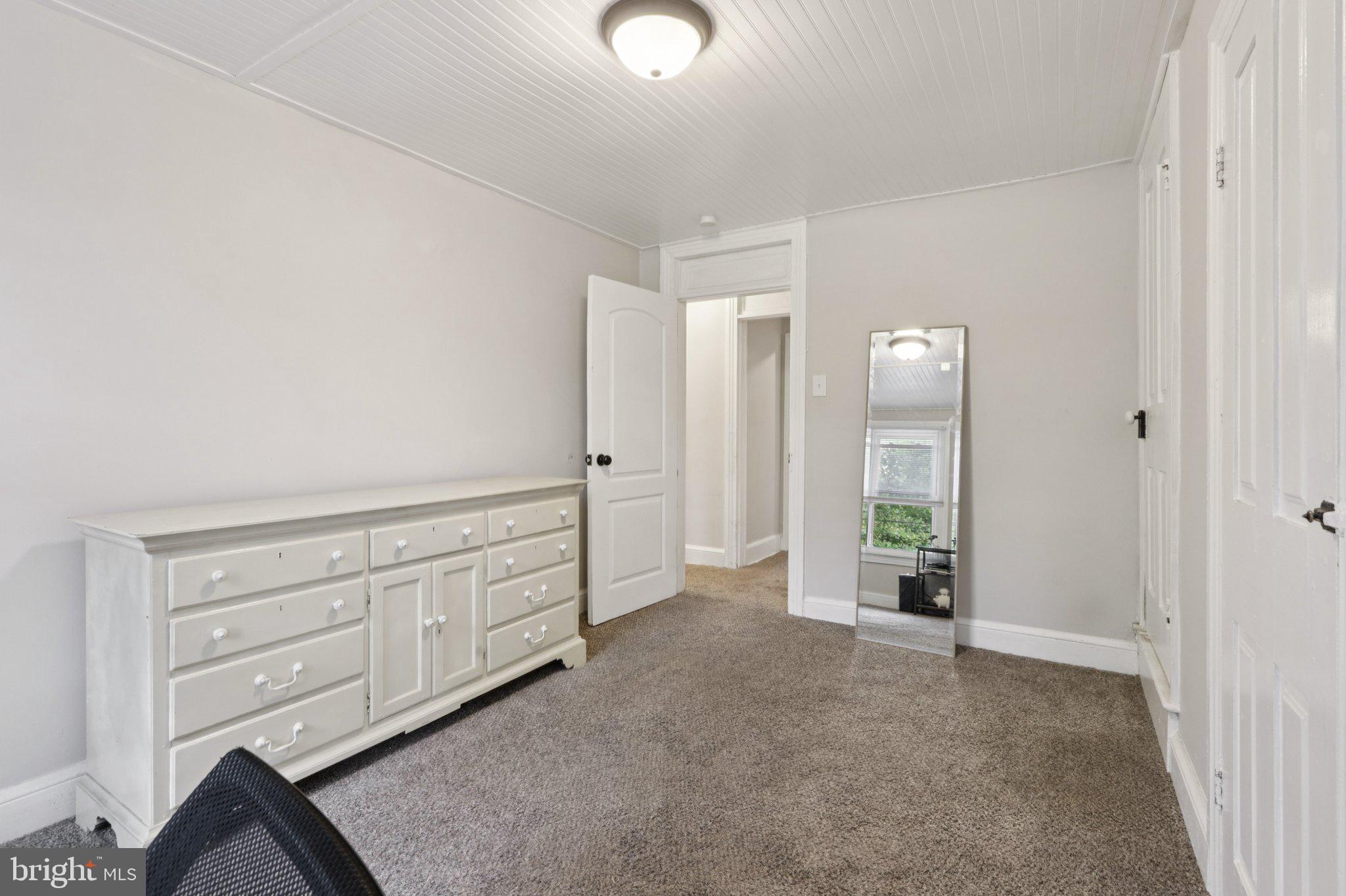 418 Walnut Street Pottstown, PA 19464 - Photo 27 of 52 an empty room with mirror and shower