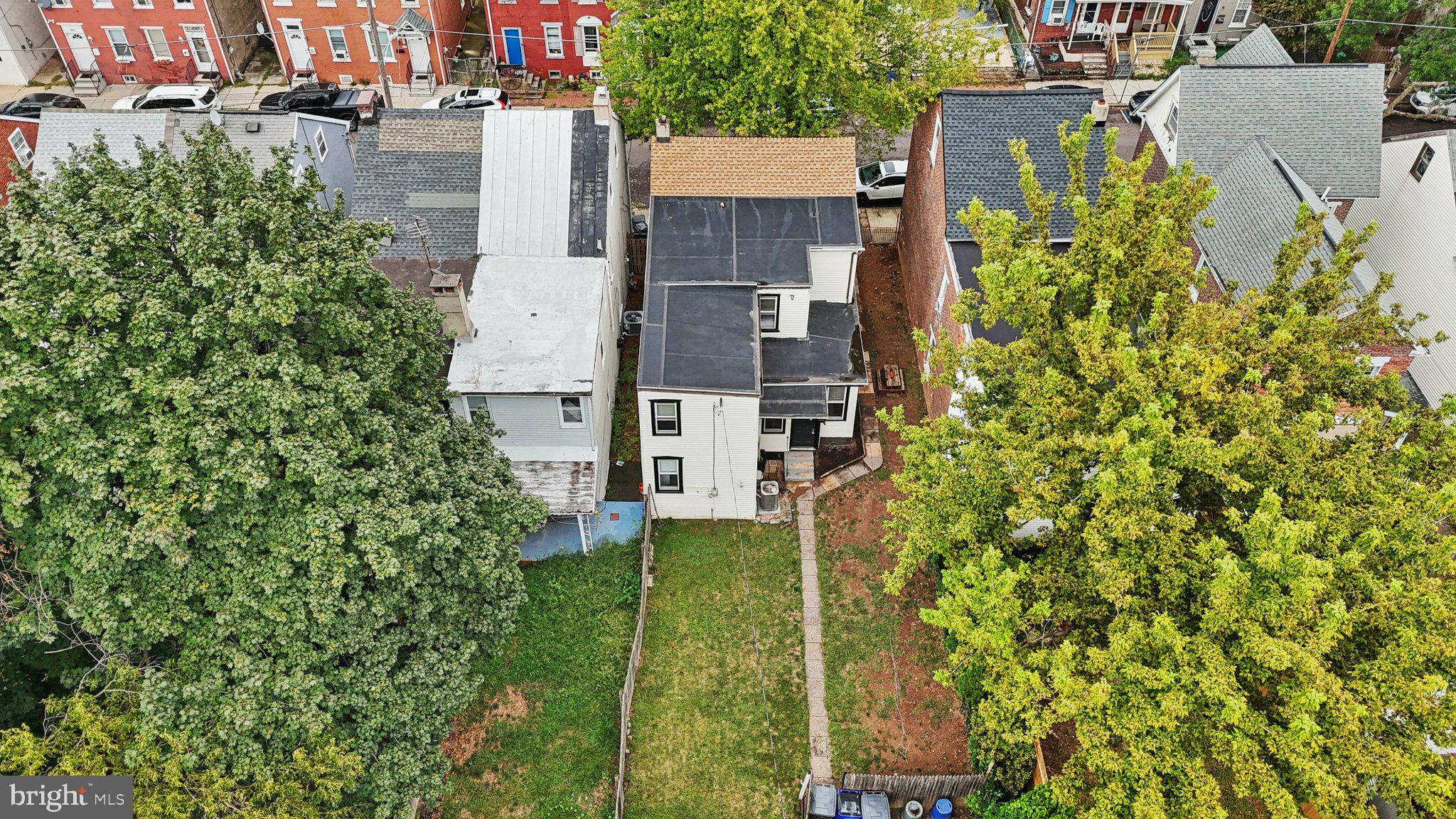 418 Walnut Street Pottstown, PA 19464 - Photo 37 of 52 an aerial view of residential house with outdoor space and trees all around