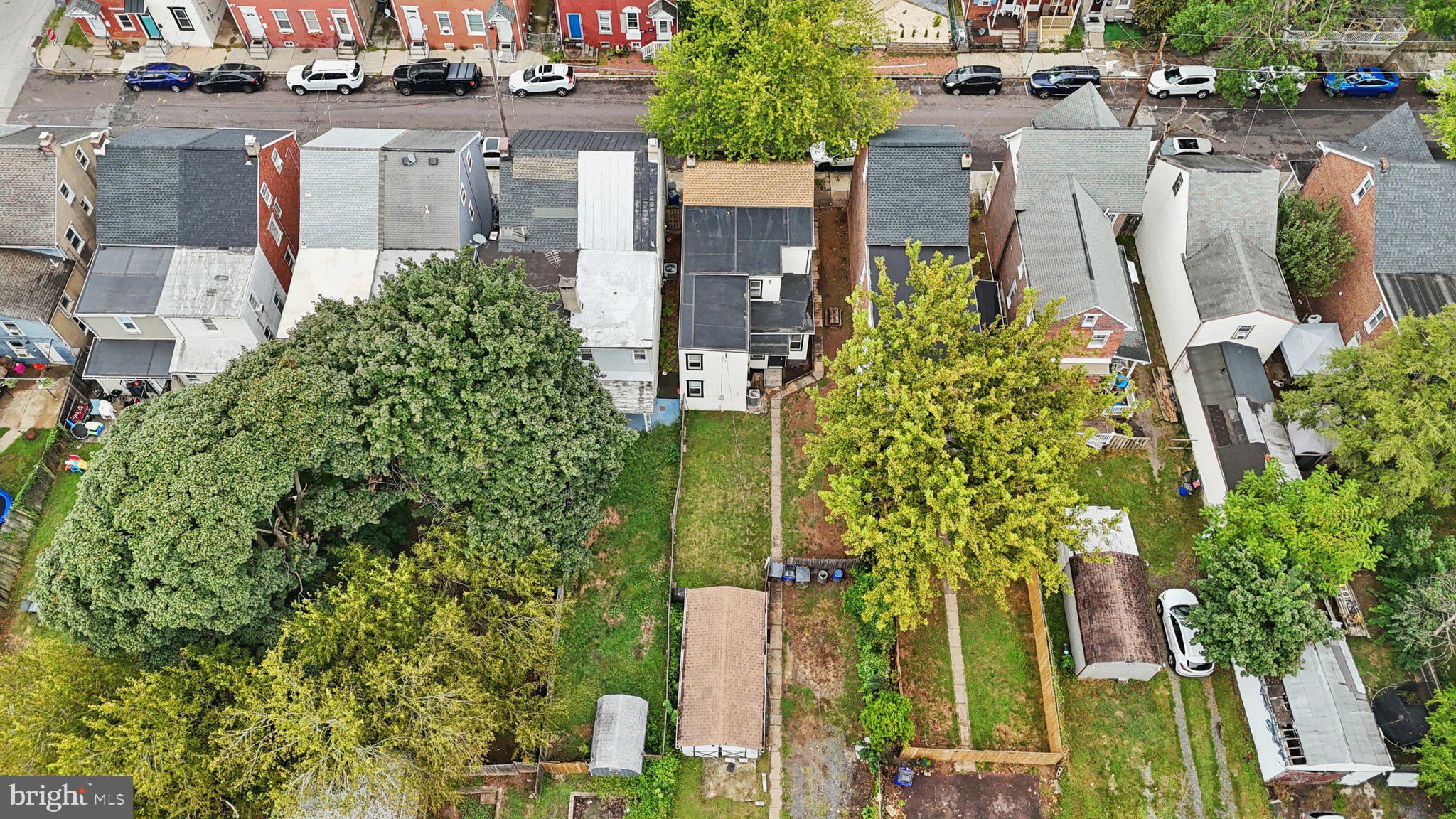 418 Walnut Street Pottstown, PA 19464 - Photo 4 of 52 an aerial view of a residential apartment building with a yard and plants