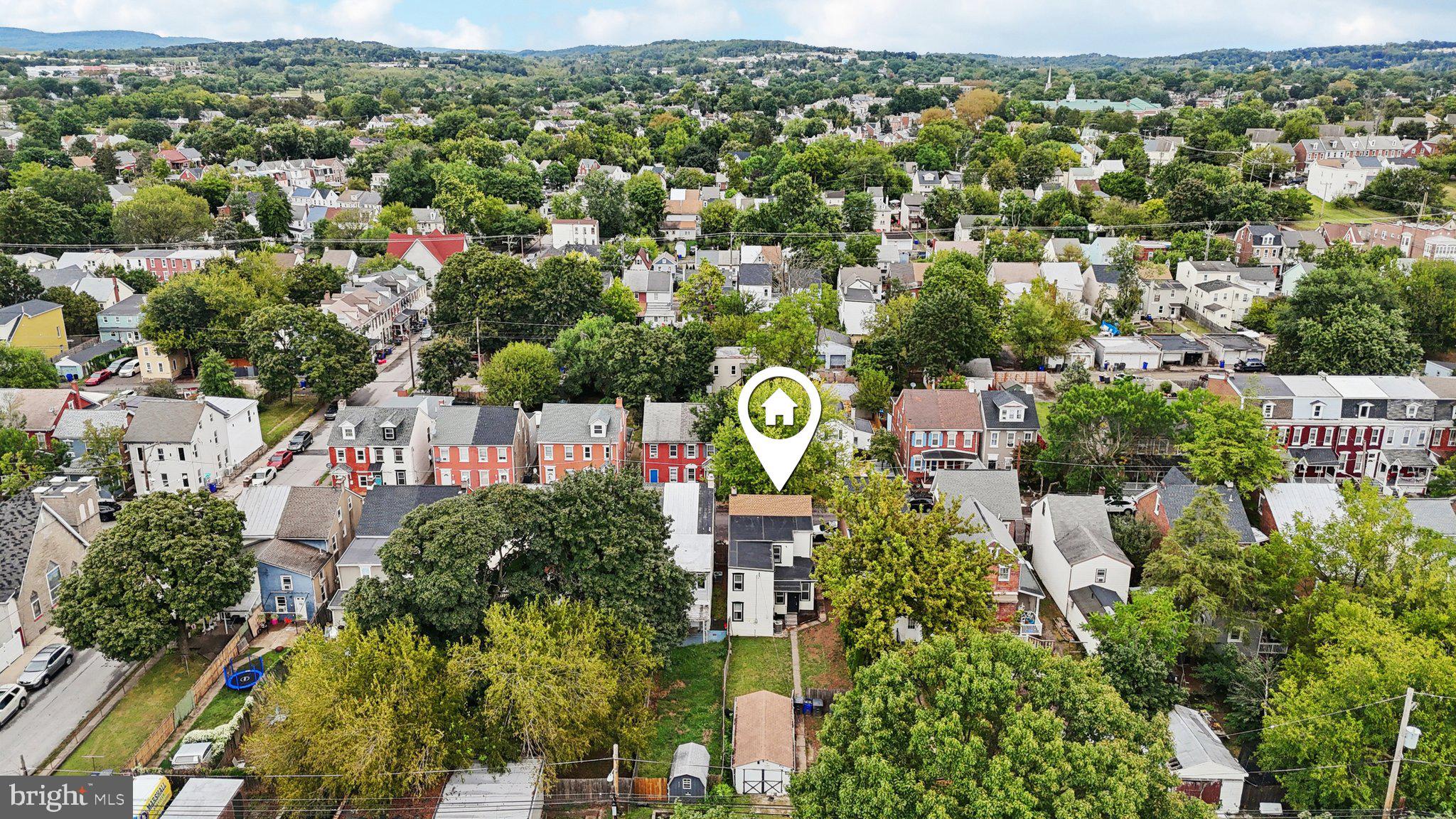 418 Walnut Street Pottstown, PA 19464 - Photo 41 of 52 an aerial view of residential houses with outdoor space and trees