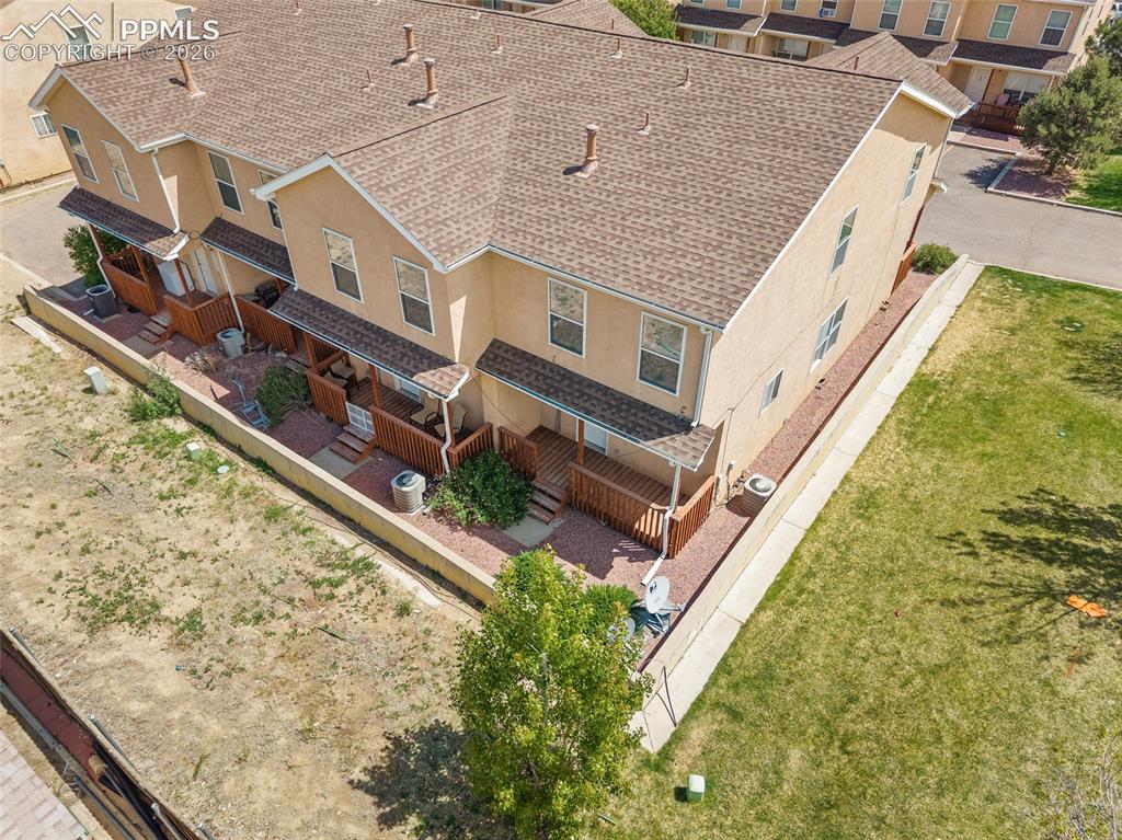 4400 Rawhide Road, Unit 157 Pueblo, CO 81008 - Photo 8 of 36 front view of a house with a yard