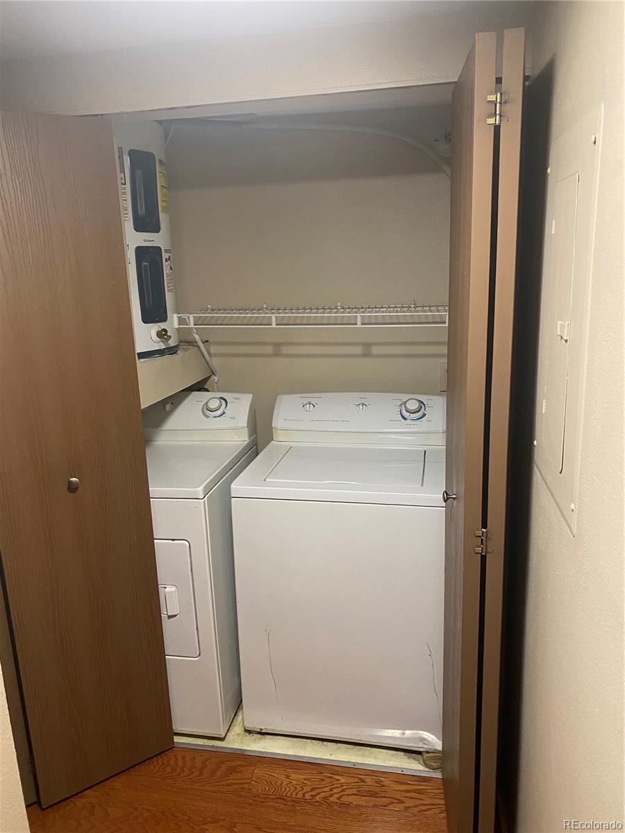 4671 South Decatur Street, Unit 232 Englewood, CO 80110 - Photo 13 of 32 a utility room with dryer and washer