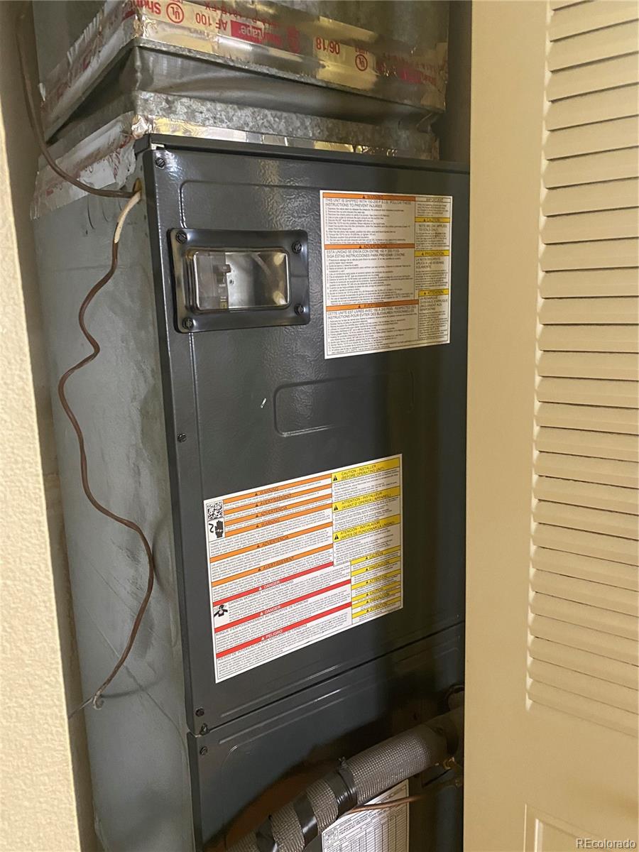 4671 South Decatur Street, Unit 232 Englewood, CO 80110 - Photo 17 of 32 a bathroom with a window and a shower