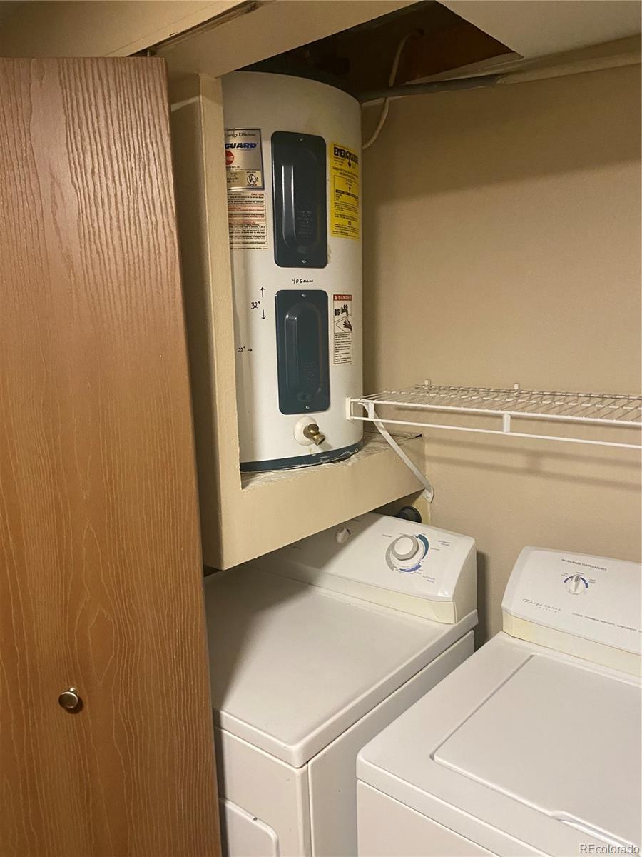 4671 South Decatur Street, Unit 232 Englewood, CO 80110 - Photo 18 of 32 a utility room with dryer and washer