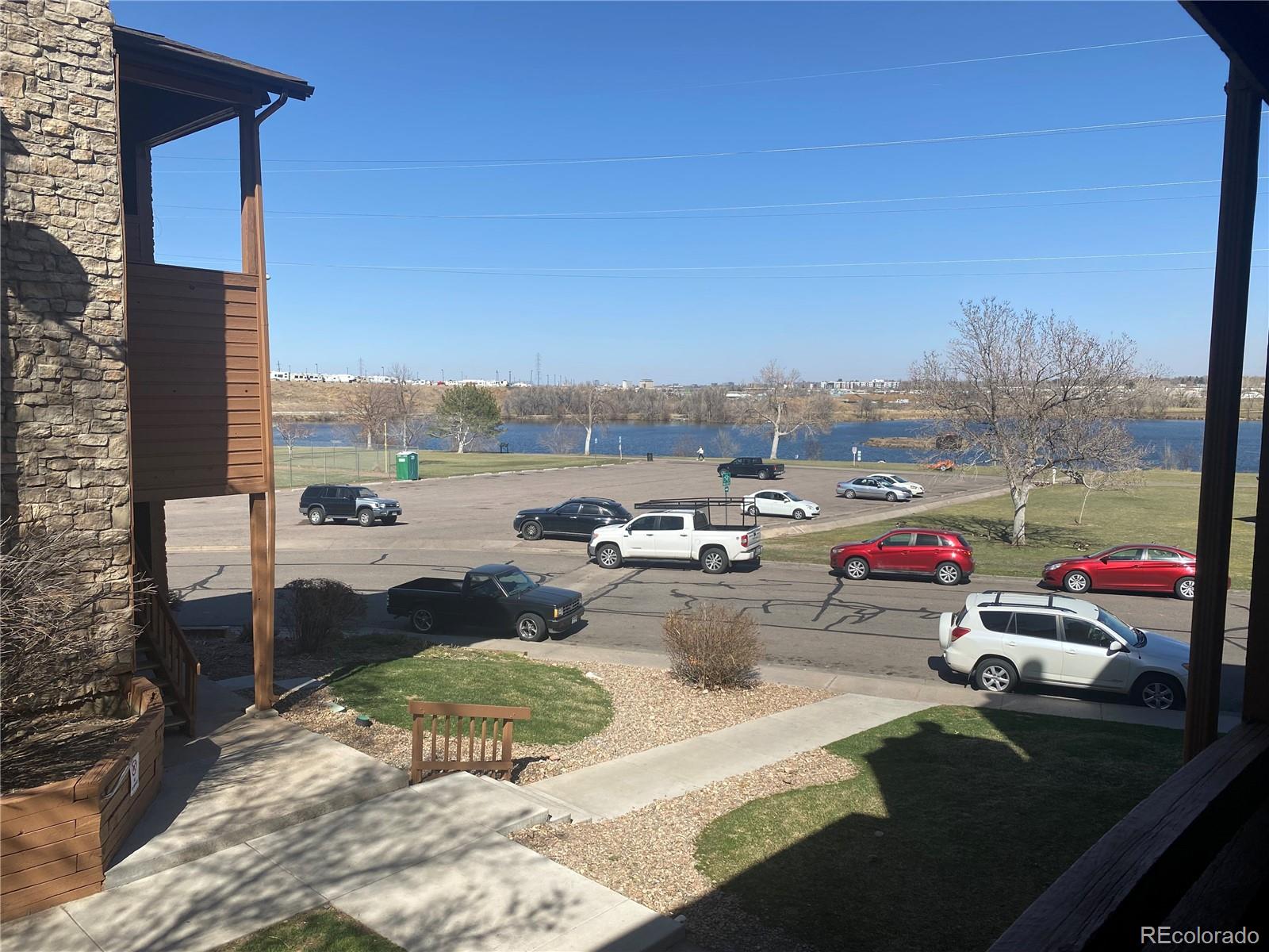 4671 South Decatur Street, Unit 232 Englewood, CO 80110 - Photo 25 of 32 a view of a terrace with chairs