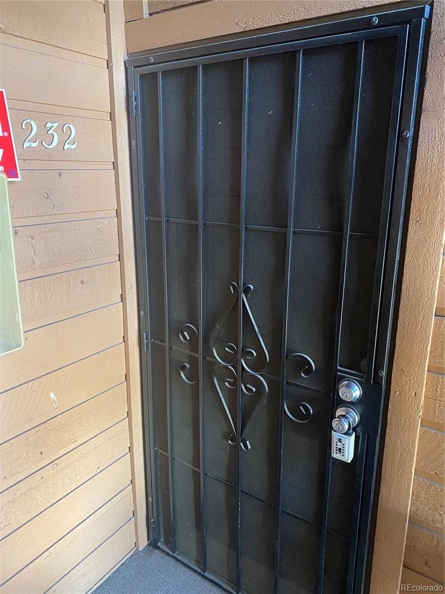 4671 South Decatur Street, Unit 232 Englewood, CO 80110 - Photo 3 of 32 a close view of door