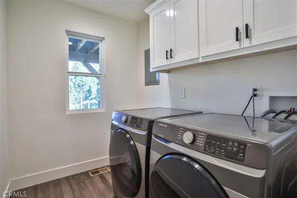 a kitchen with a stove and a microwave