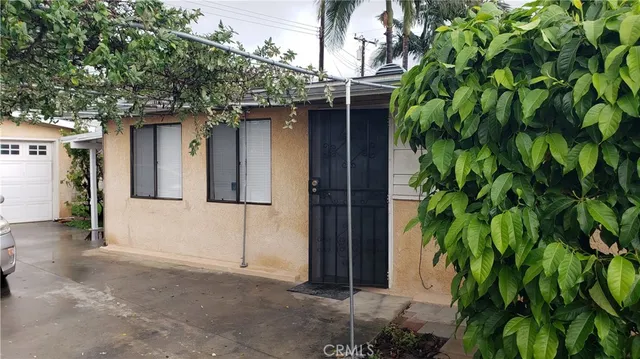 a yellow house with outdoor space