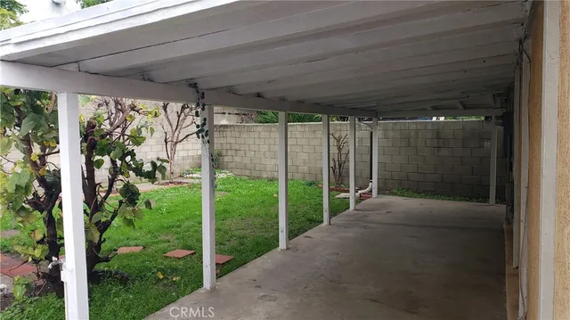 a view of a backyard with garden