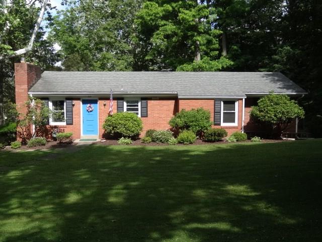 Stunning ranch on a picturesque corner lot.