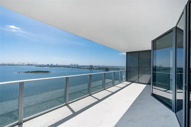 a view of balcony with furniture