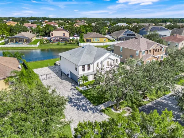 an aerial view of a house with a garden