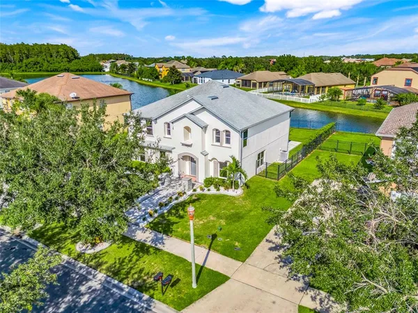 an aerial view of a house with a garden