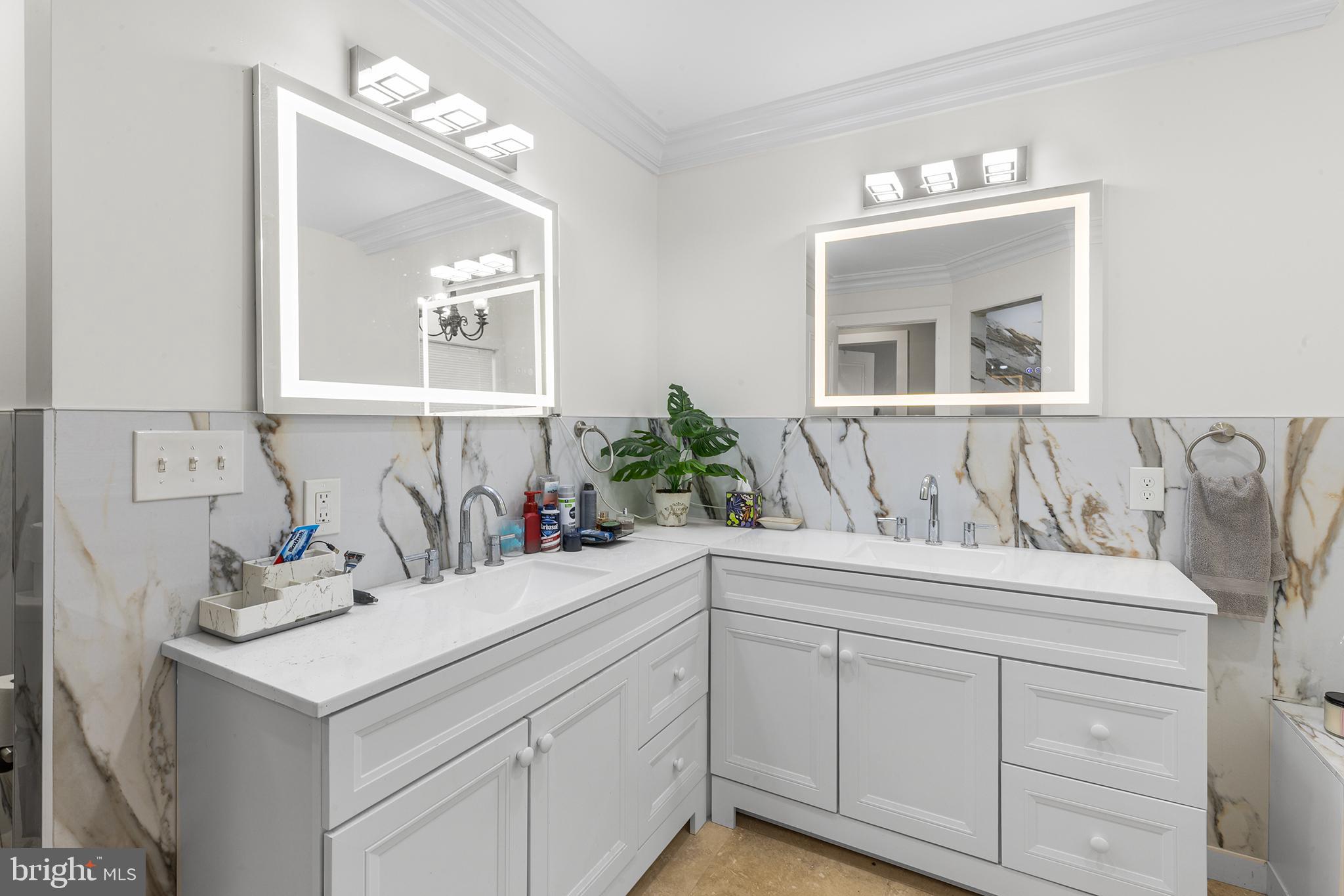 118 Blough Road Fairless Hills, PA 19030 - Photo 16 of 37 a bathroom with a sink and a mirror