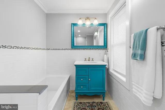 a bathroom with a shower and a shower