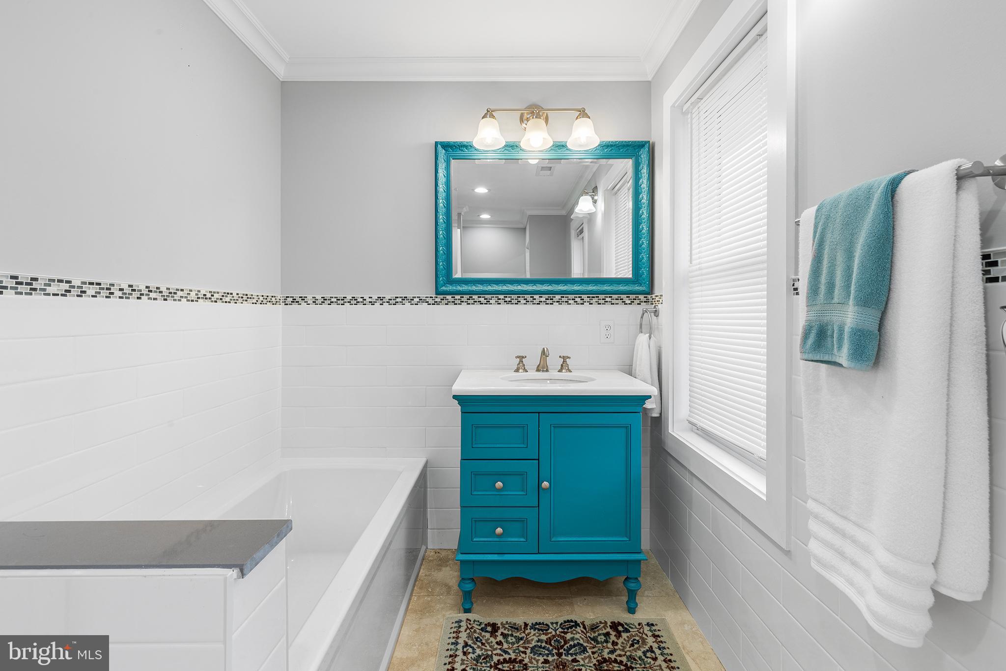 118 Blough Road Fairless Hills, PA 19030 - Photo 21 of 37 a bathroom with a bathtub sink and mirror