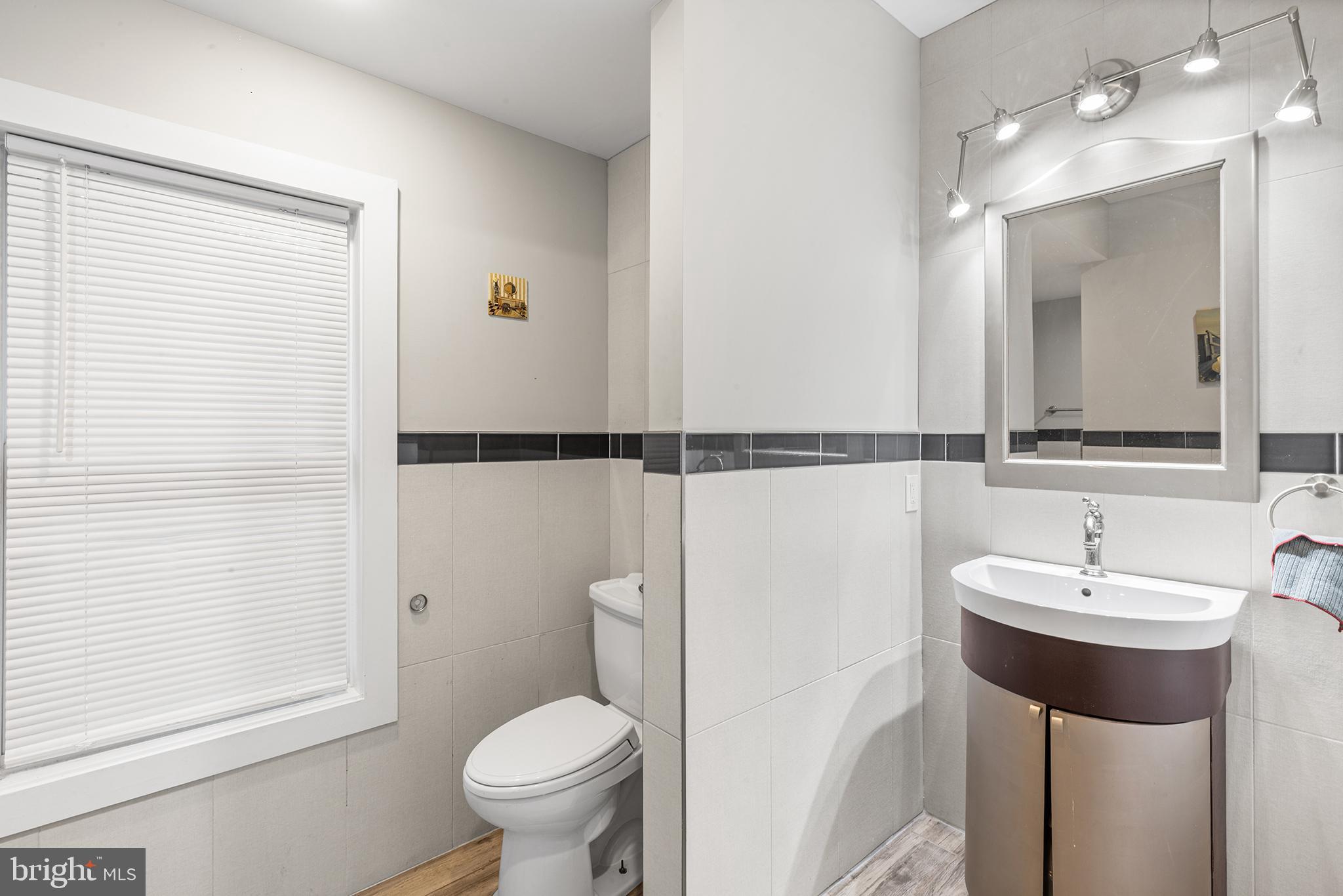 118 Blough Road Fairless Hills, PA 19030 - Photo 28 of 37 a bathroom with a sink and a mirror