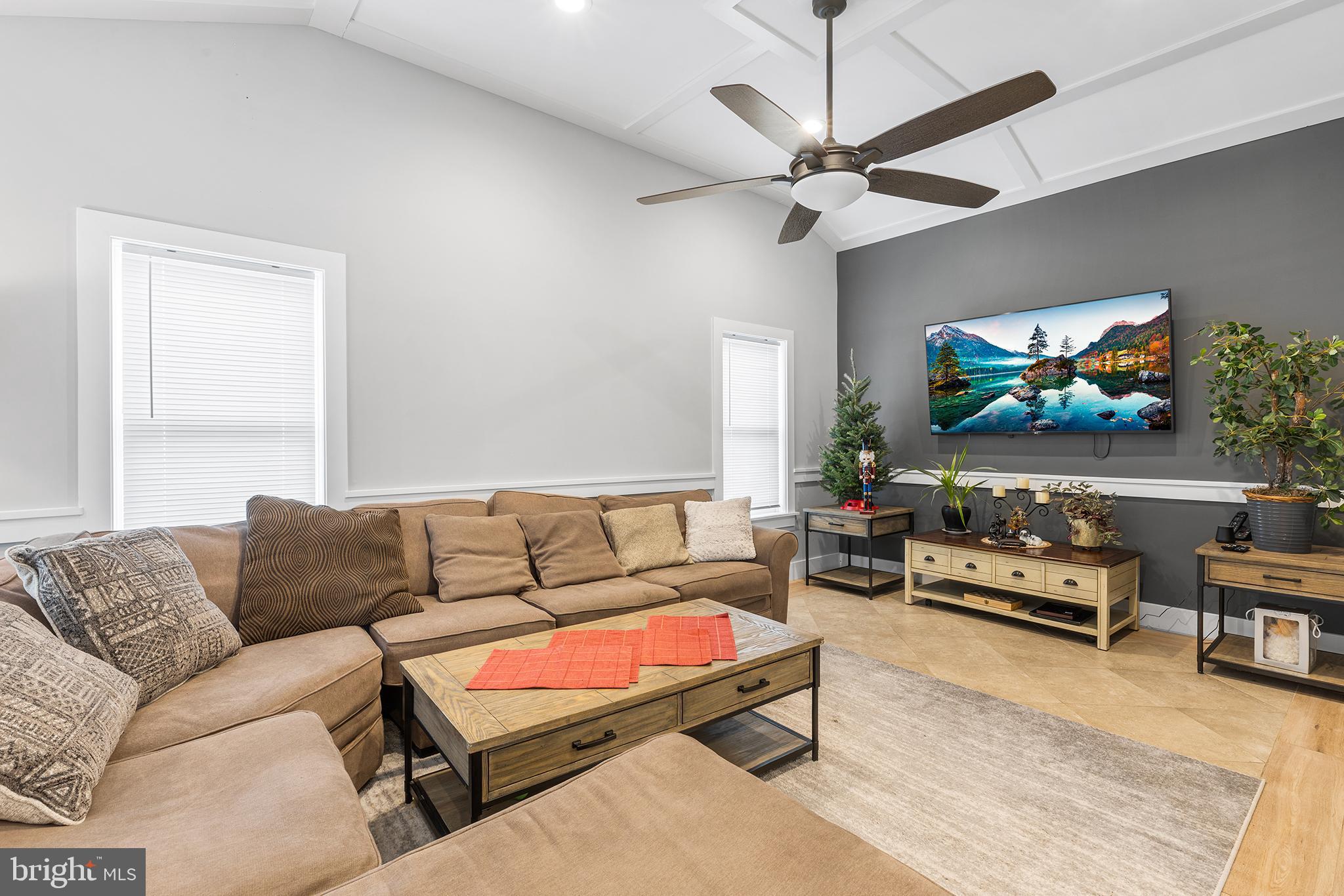 118 Blough Road Fairless Hills, PA 19030 - Photo 4 of 37 a living room with furniture a flat screen tv and a window