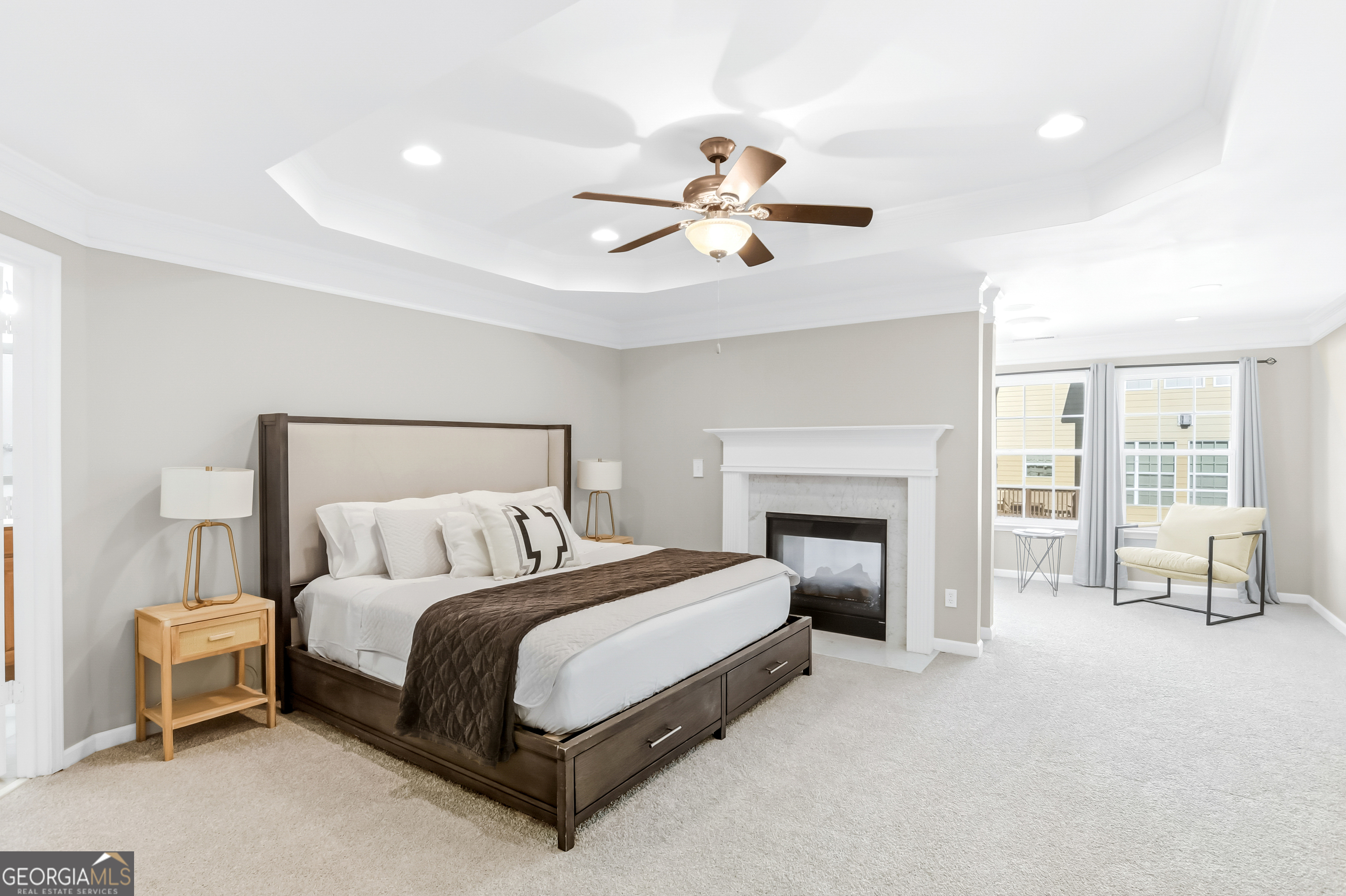 2205 Concordia Way Southeast, Unit 12 Smyrna, GA 30126 - Photo 13 of 25 a spacious bedroom with a bed and a fireplace