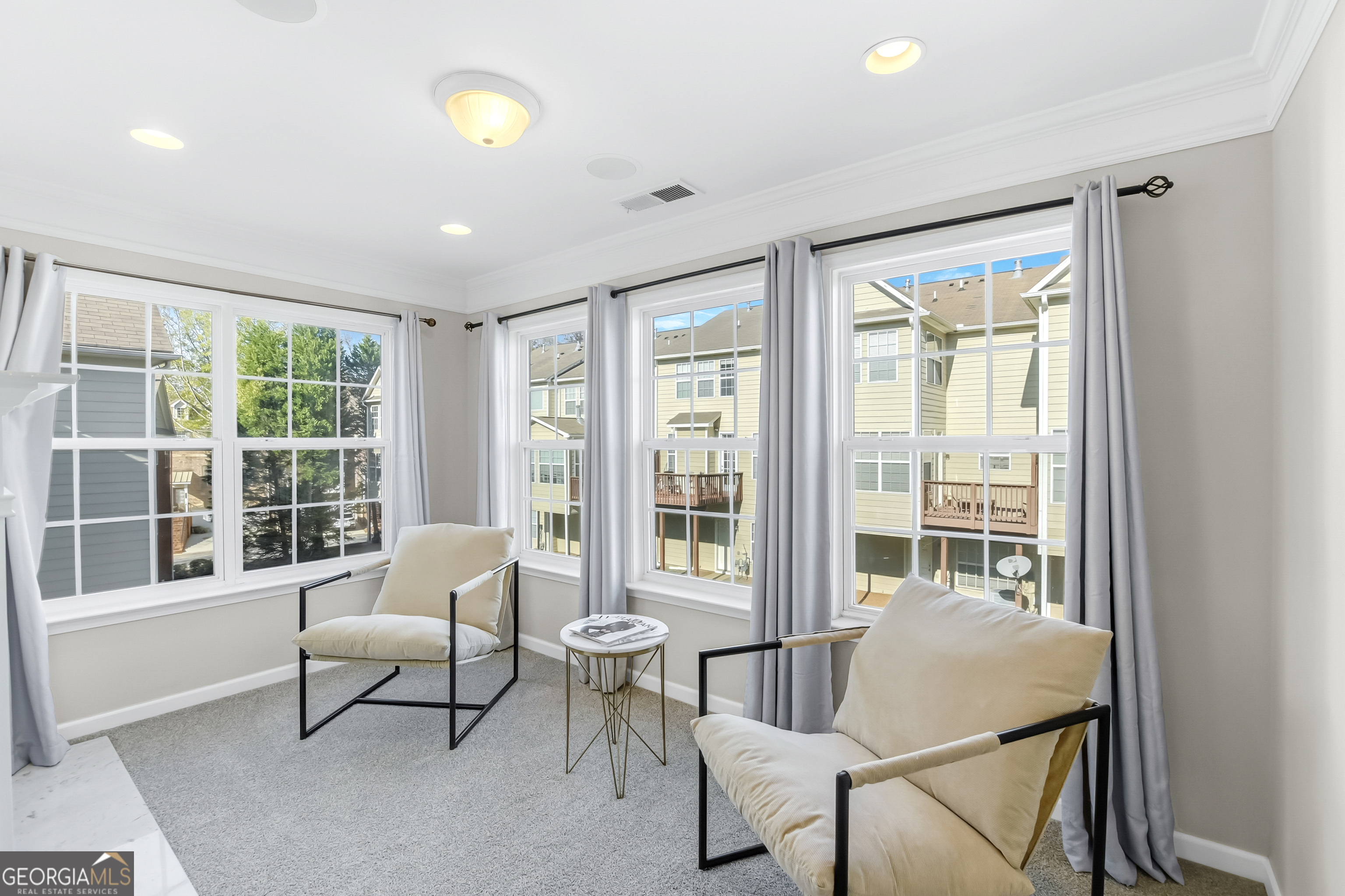2205 Concordia Way Southeast, Unit 12 Smyrna, GA 30126 - Photo 14 of 25 a living room with furniture and a window