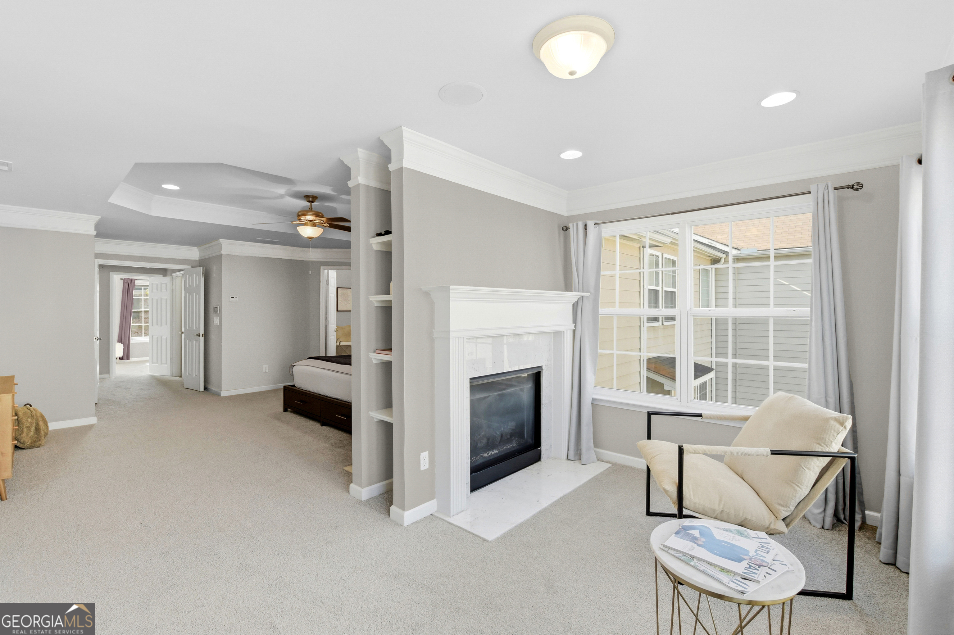 2205 Concordia Way Southeast, Unit 12 Smyrna, GA 30126 - Photo 15 of 25 a living room with furniture and a fireplace