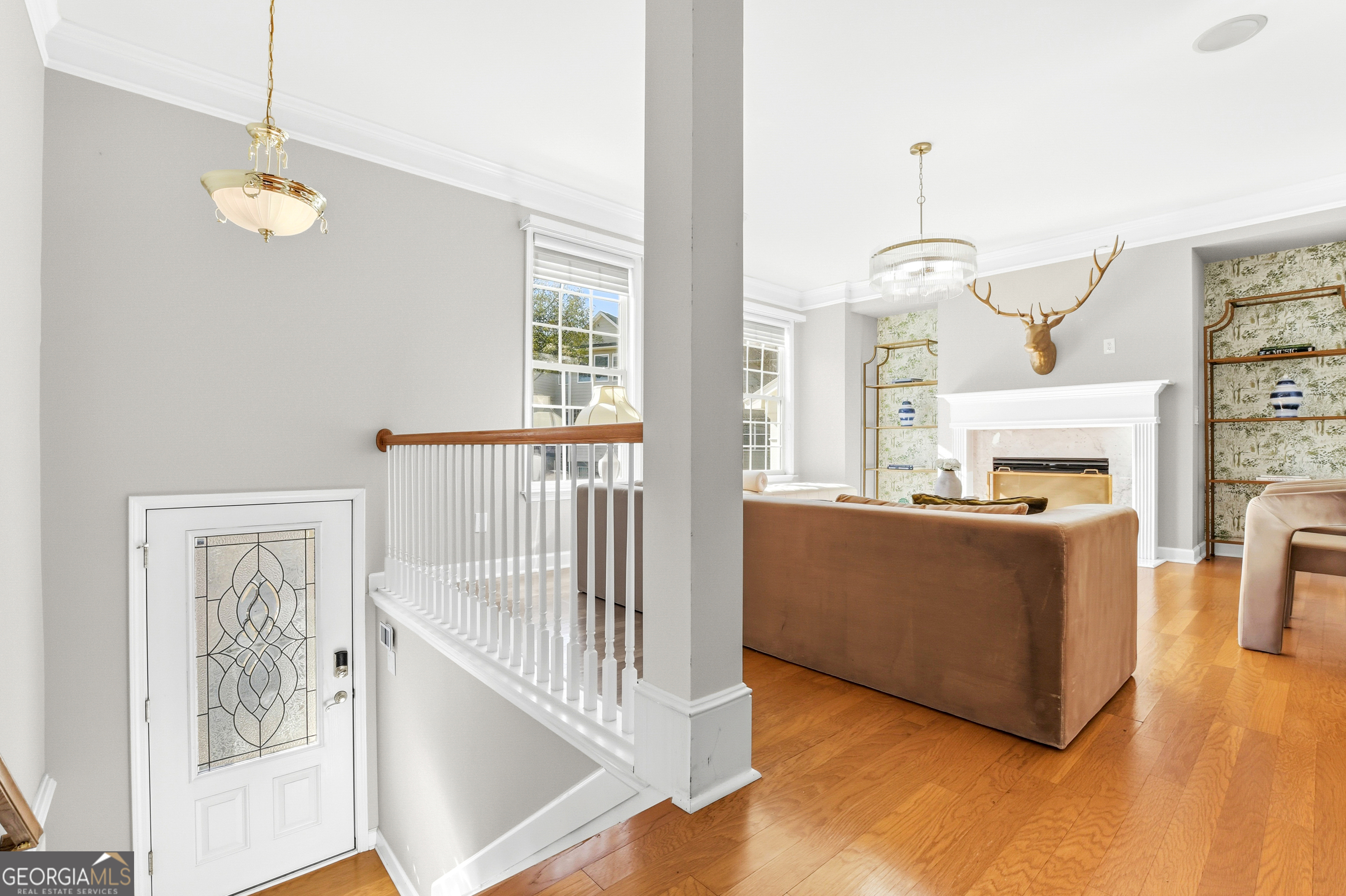 2205 Concordia Way Southeast, Unit 12 Smyrna, GA 30126 - Photo 4 of 25 a living room with furniture and a wooden floor