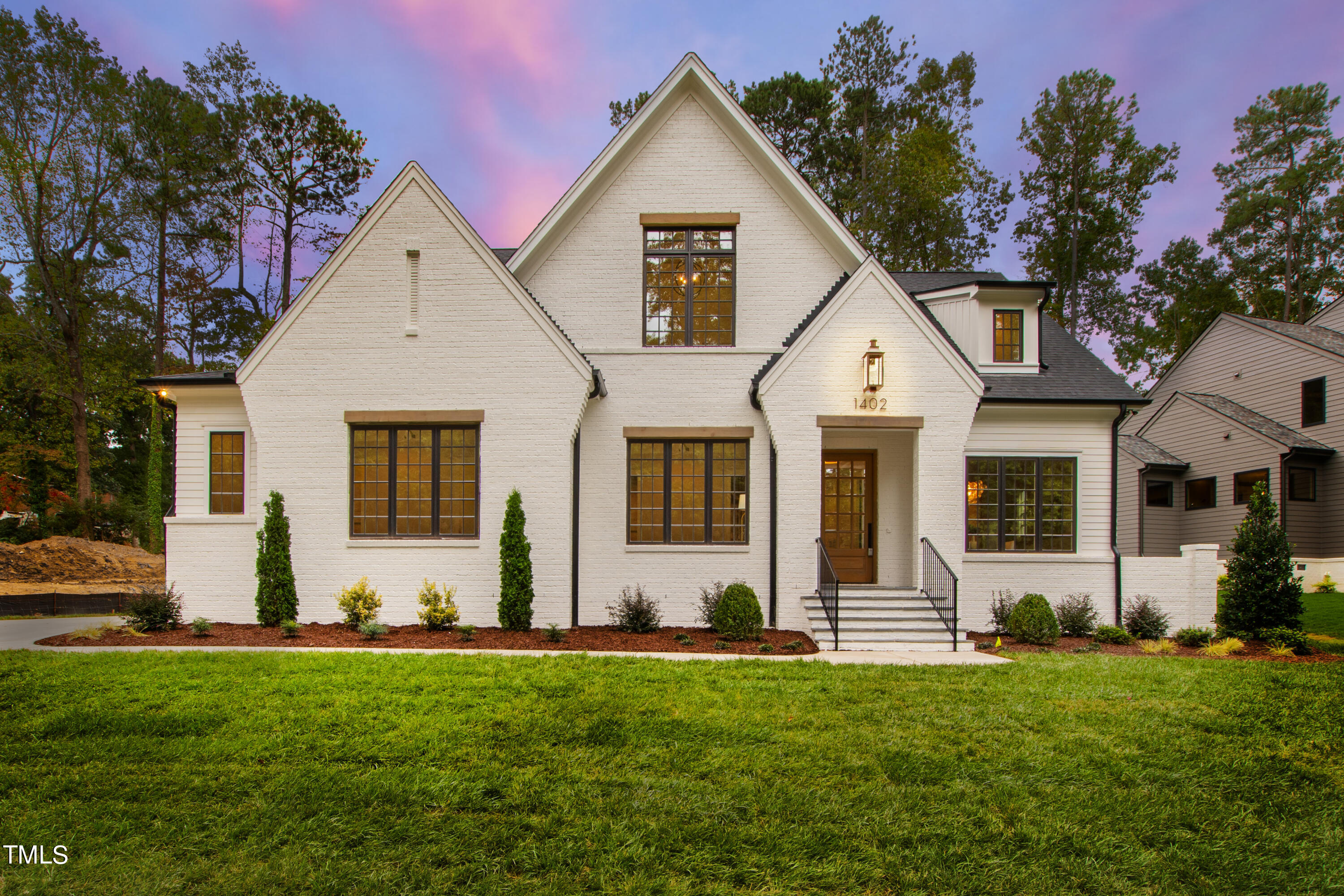 1402 Hunting Ridge Road Raleigh, NC 27615 - Photo 1 of 73 twilight front