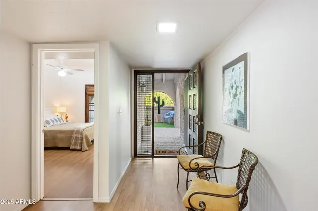 a view of a livingroom with furniture and windows