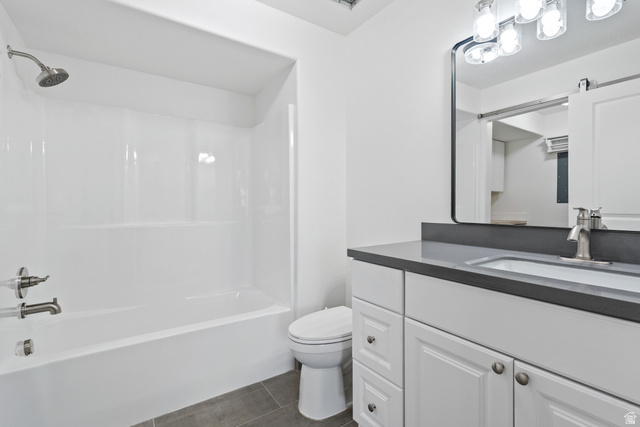 8204 North Cedar Springs Road, Unit 2 Eagle Mountain, UT 84005 - Photo 14 of 17 Bathroom featuring vanity and shower combination