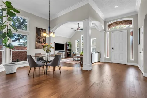 a living room with furniture and a rug
